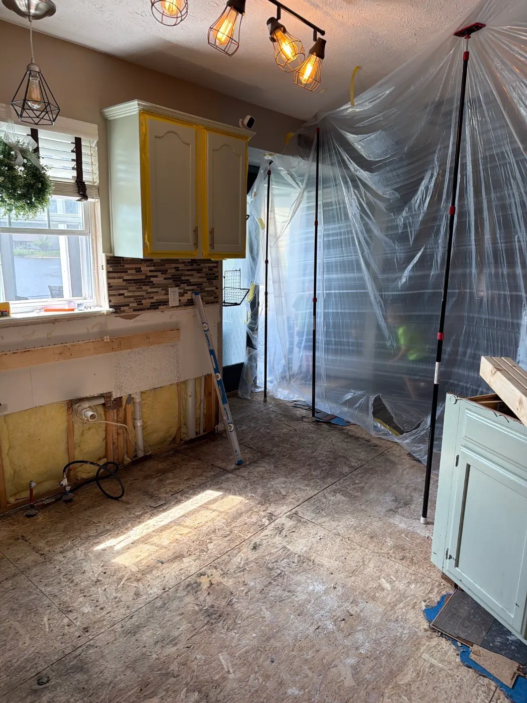 Sump pump backup water removal in Meridian Hills residential basement